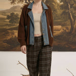 graced Emilie cable knit jacket in brown with denim trim worn by a model with plaid trousers