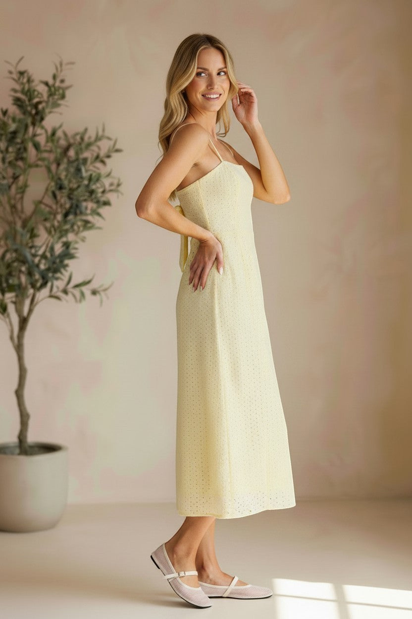 Allie Rose eyelet tie-back midi dress with delicate eyelet fabric and a flowing silhouette, featuring a stylish tie-back design.