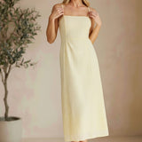 Allie Rose eyelet tie-back midi dress in soft fabric with a feminine silhouette, featuring a tie-back detail and eyelet pattern.