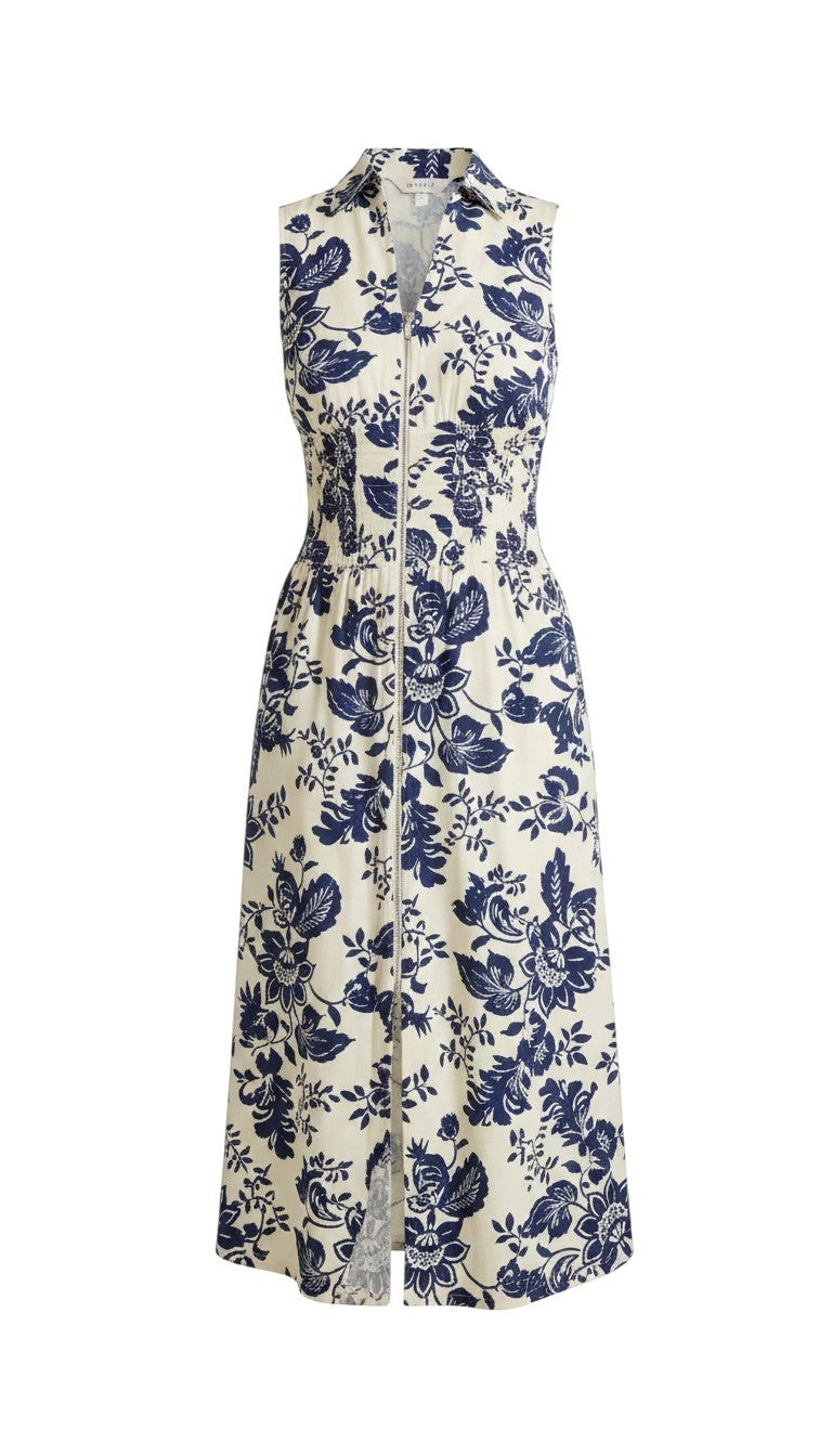 Doe and Rae V-neck smocked waist midi dress with floral print, featuring a flowing skirt and elegant design.