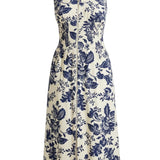 Doe and Rae V-neck smocked waist midi dress with floral print, featuring a flowing skirt and elegant design.