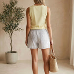 Wishlist Julia Floral Shorts in white and grey cotton with a vibrant floral pattern, perfect for casual summer wear.