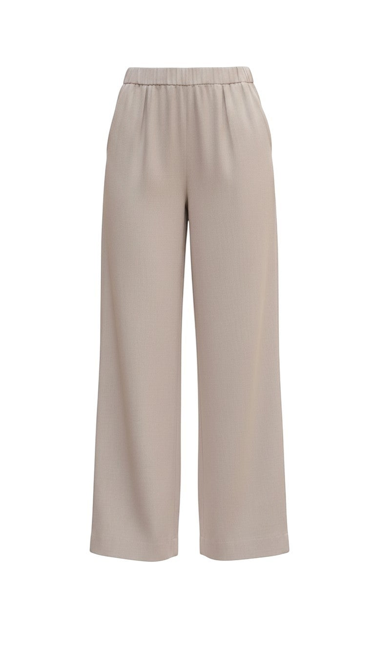 Be Cool beige flowy Tencel wide-leg pants shown on model, featuring a relaxed fit and comfortable casual style.