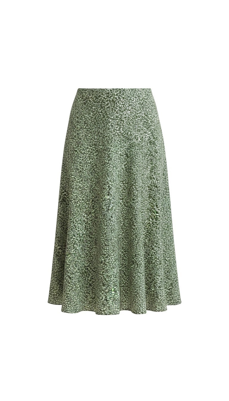 graced midi skirt in green with a delicate white floral print, featuring a flowing silhouette and polyester fabric.