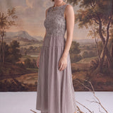 graced Harper midi dress in brown gingham with a smocked bodice, worn by a model with beige ankle boots