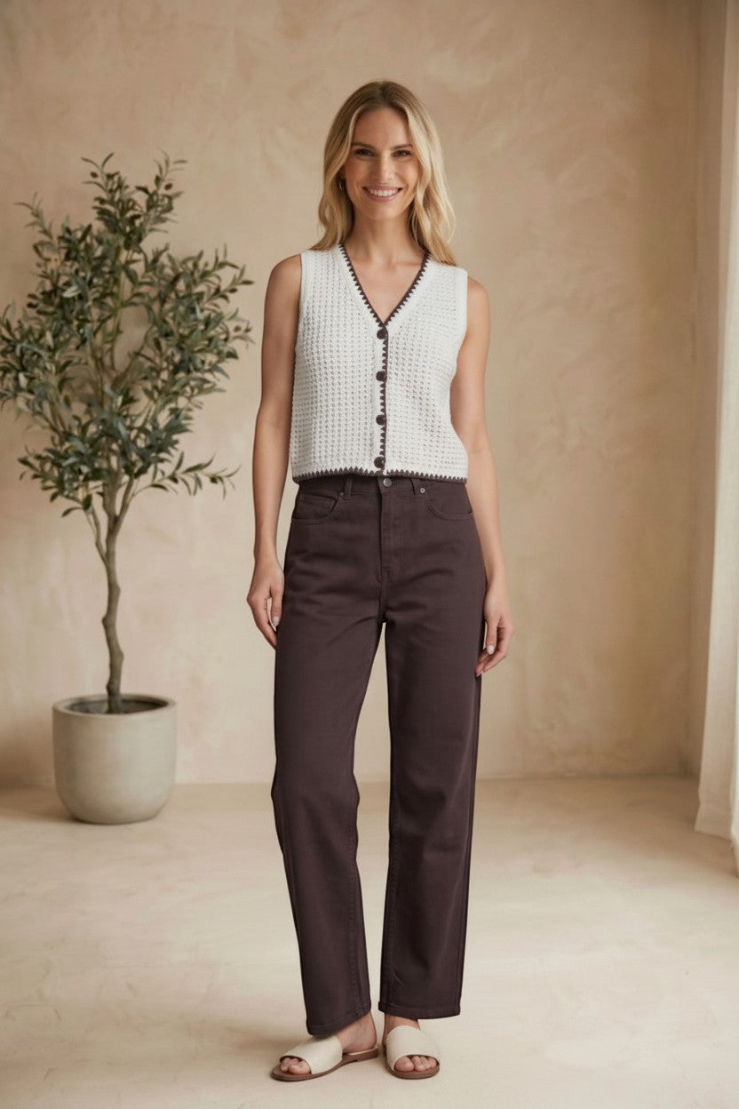 Dark brown Miou Muse high rise straight jeans worn by a model, showcasing classic denim style and fit.