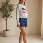 graced blue denim high-waisted shorts with elastic waistband and tie closure, 3-inch inseam, 90% cotton
