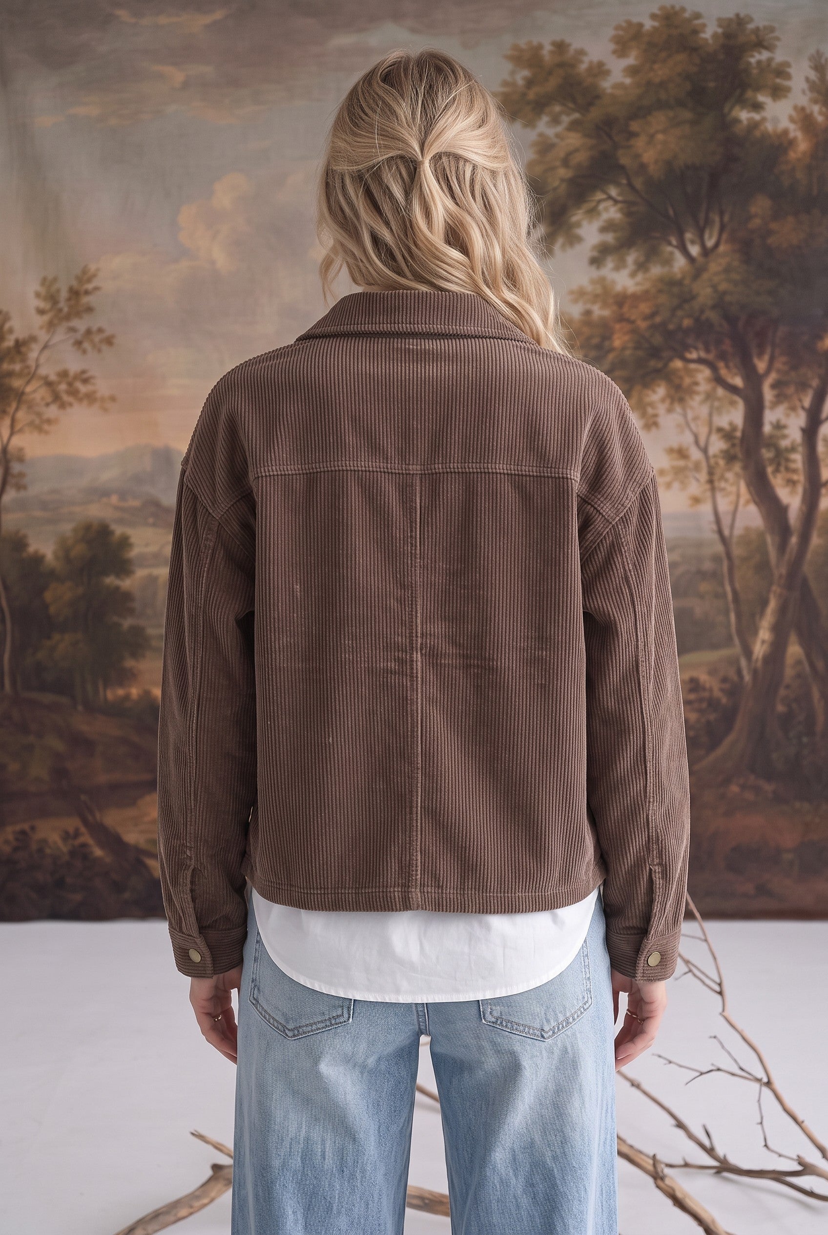 graced The Jess brown corduroy jacket worn by a blonde woman, back view showing relaxed fit and classic collar