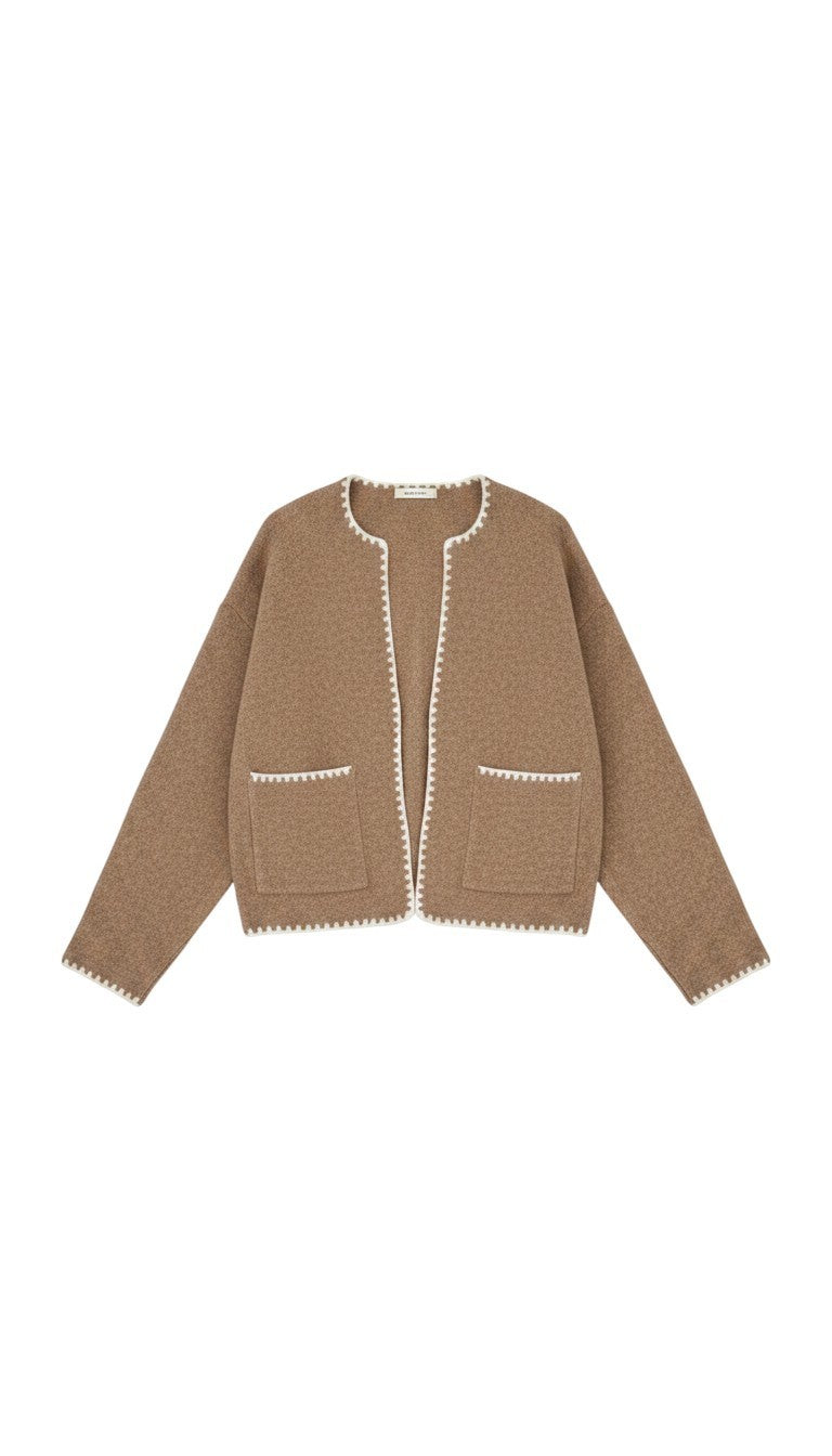 graced The Judy Open Cardigan in brown with white contrast whipstitch trim, open front, and two front pockets.