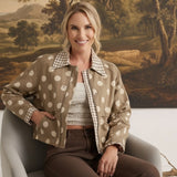 graced Julia canvas twill jacket in tan with white polka dots and a gingham collar, worn by a smiling woman