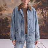 graced Julie denim jacket with brown corduroy contrast collar and latch hook closures worn by a model
