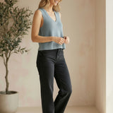 Be Cool knit V-neck tank top in denim, displayed on a model, featuring a fitted sleeveless design with a V neckline.