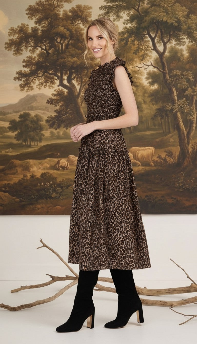 graced Leah sleeveless midi dress in leopard print with smocked waist and ruffled shoulders worn by a blonde model