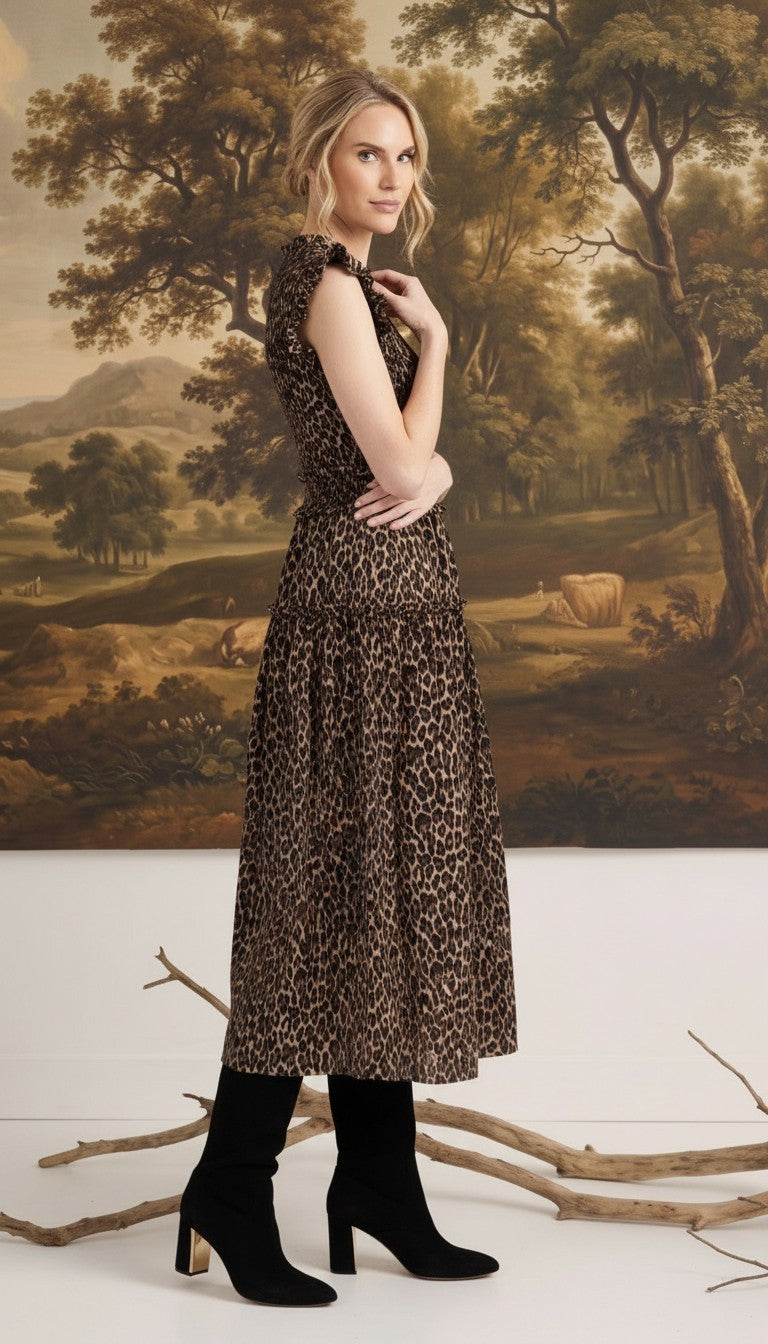 graced Leah sleeveless midi dress in leopard print with a smocked waist and v-neckline worn by a model