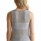 Light blue Forte sleeveless crochet knit tank top displayed on a hanger, showcasing its textured knit pattern and sleeveless design.