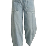 graced light wash denim barrel pants with a relaxed fit, elastic drawstring waist, and large front patch pockets.