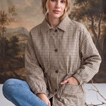 graced The Macy Mock Neck Jacket in a tan and brown gingham print with a button-front closure and drawstring waist