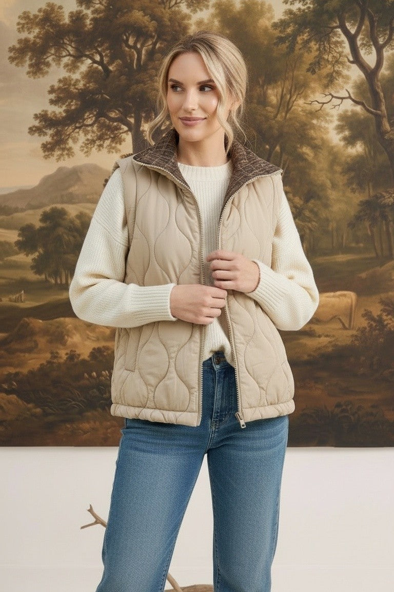 graced Madilynne beige quilted vest with a plaid collar worn by a woman over a white sweater and blue jeans