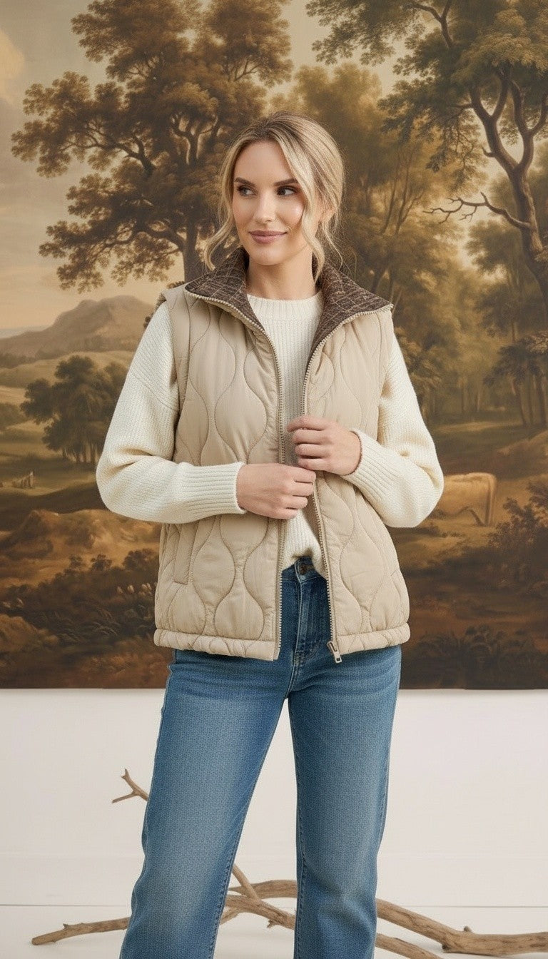 graced Madilynne beige quilted vest with a plaid collar worn by a woman over a white sweater and blue jeans