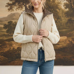graced Madilynne beige quilted vest with a plaid collar worn by a woman over a white sweater and blue jeans