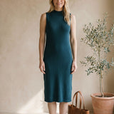 Graceful sleeveless ribbed knit midi dress by Graced, featuring a fitted silhouette and soft fabric, shown on a model.
