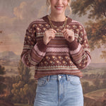 graced mocha Fair Isle knit sweater with floral and geometric patterns, crew neck, and ribbed cuffs on a model.