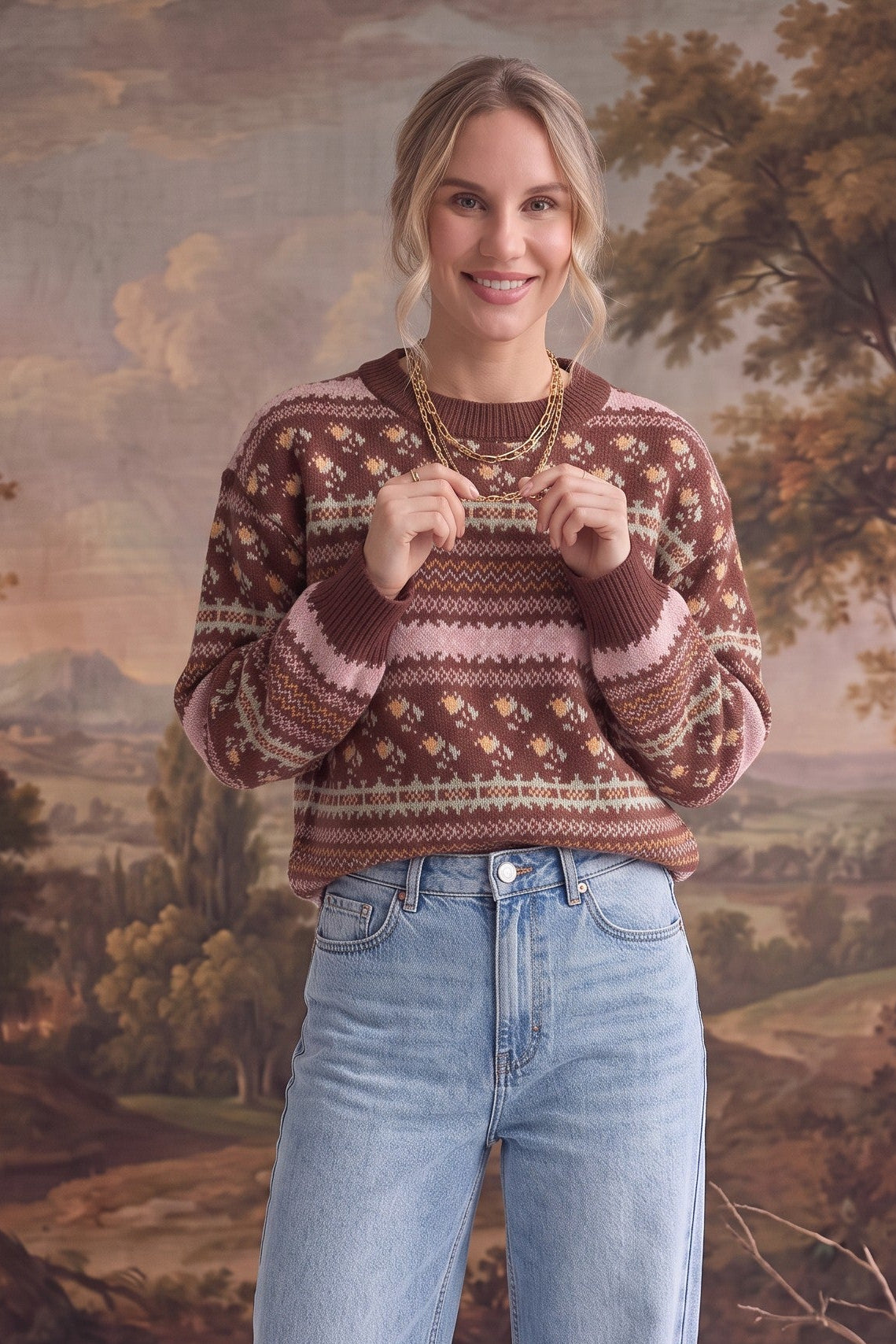 graced mocha Fair Isle knit sweater with floral and geometric patterns, crew neck, and ribbed cuffs on a model.