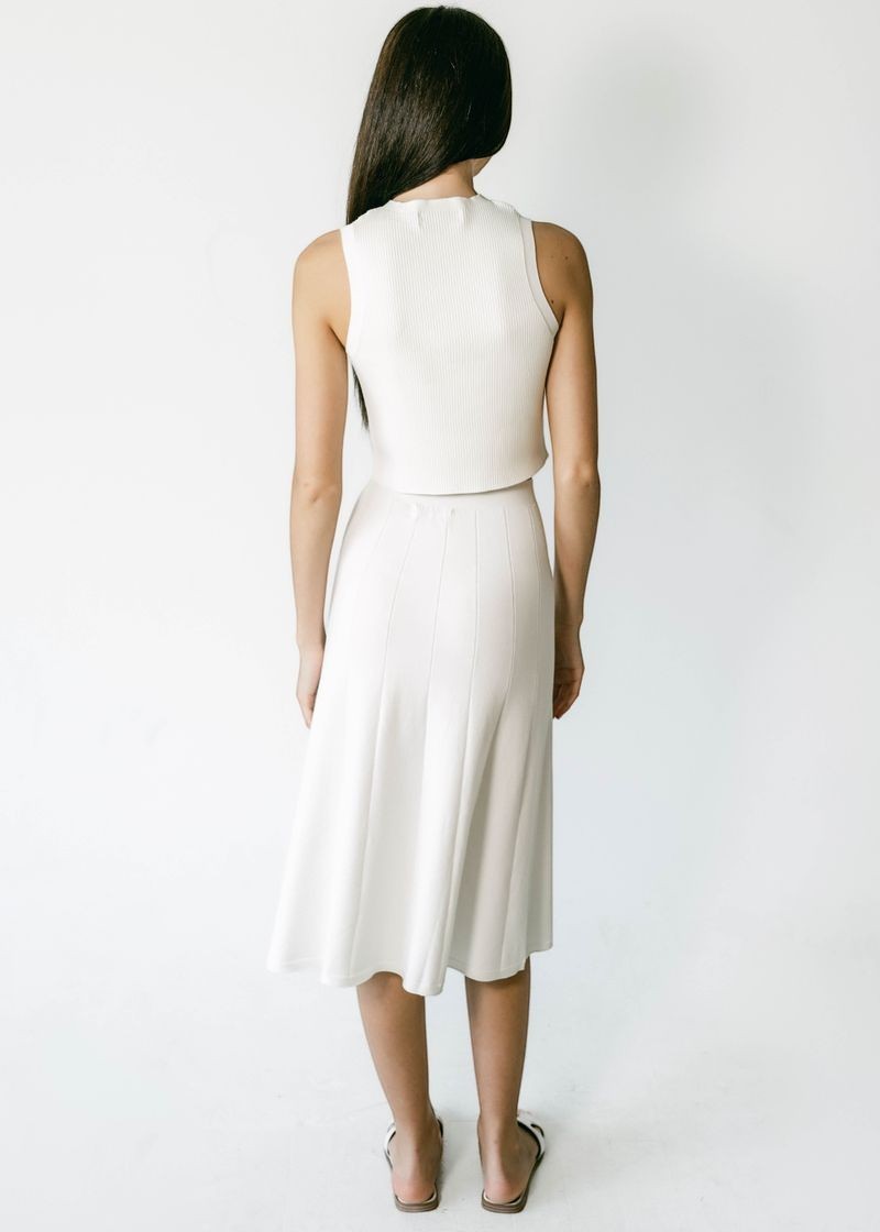 graced Monica white ribbed midi skirt made from EcoViscose blend with A-line silhouette and pull-on waistband.