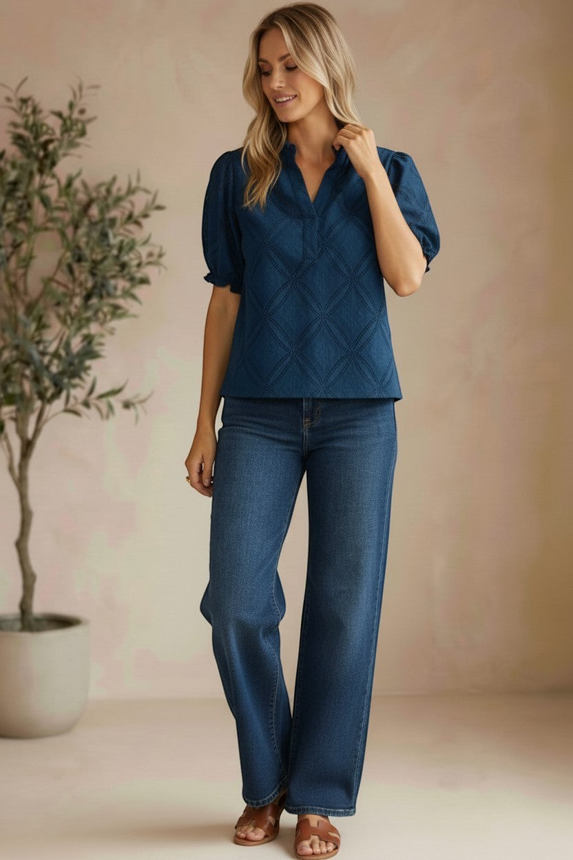 Navy puff sleeve split neck blouse by Lovestitch, featuring long sleeves and a stylish, feminine design.