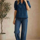 Navy puff sleeve split neck blouse by Lovestitch, featuring long sleeves and a stylish, feminine design.