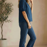 Navy puff sleeve split neck blouse from Lovestitch featuring ruffled puff sleeves and a relaxed fit.