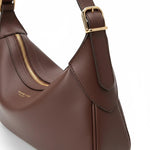 Melie Bianco Nicolette shoulder bag in espresso leather with gold-tone hardware and adjustable shoulder strap.