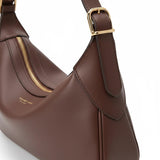Melie Bianco Nicolette shoulder bag in espresso leather with gold-tone hardware and adjustable shoulder strap.
