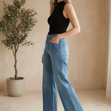 JBD Patch Pocket Wide Leg Jeans, stylish denim bottoms with patch pockets and a relaxed wide-leg fit.