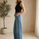 JBD patch pocket wide-leg jeans, casual denim bottoms with large patch pockets and relaxed fit, front view.
