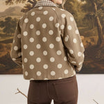 graced Julia canvas twill jacket in tan with white polka dots and a gingham collar worn by a woman from the back