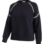 graced The Sheila Sweater in navy blue with cream-colored whipstitch detailing along the raglan sleeves