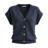 Navy sleeveless button-down top from in february, casual basic top with a collared neckline and front buttons.