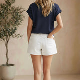 Navy sleeveless button-down top from in February, casual and versatile basic top for warm weather.