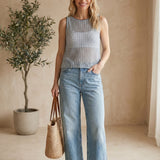 Blue Forte sleeveless crochet knit tank top made of cotton, featuring intricate crochet patterns and a sleeveless design.