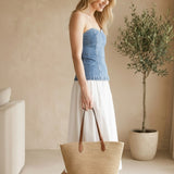 Fore Collection strapless denim maxi dress with contrast design, flowing skirt, and strapless style perfect for summer wear.