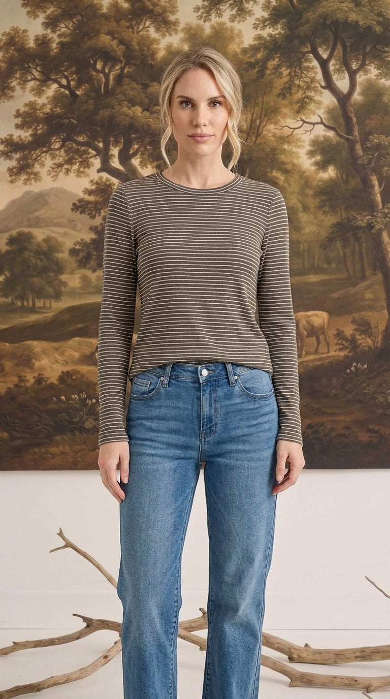 graced long sleeve top with horizontal stripes in olive and white worn by a woman with blue jeans