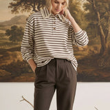 graced Tracy striped polo top with lace collar detail worn by a model in a studio setting