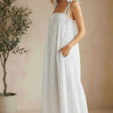 Striped Lovestitch shirred tie-shoulder maxi dress with flowing silhouette and adjustable straps, perfect for warm weather.