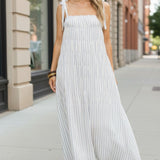 Striped Lovestitch shirred tie shoulder maxi dress with flowing fabric and elegant design, perfect for summer or casual occasions.