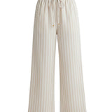 Allie Rose striped smock waist pants featuring a relaxed fit, lightweight fabric, and bold vertical stripes for a stylish look.