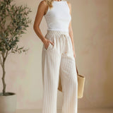 Allie Rose striped smock waist pants featuring a relaxed fit with vertical multicolor stripes and a comfortable, stylish design.