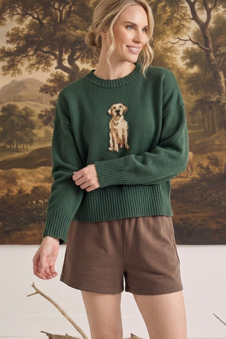 graced The Sydney Retriever Sweater in forest green with a golden retriever knit design worn by a blonde model