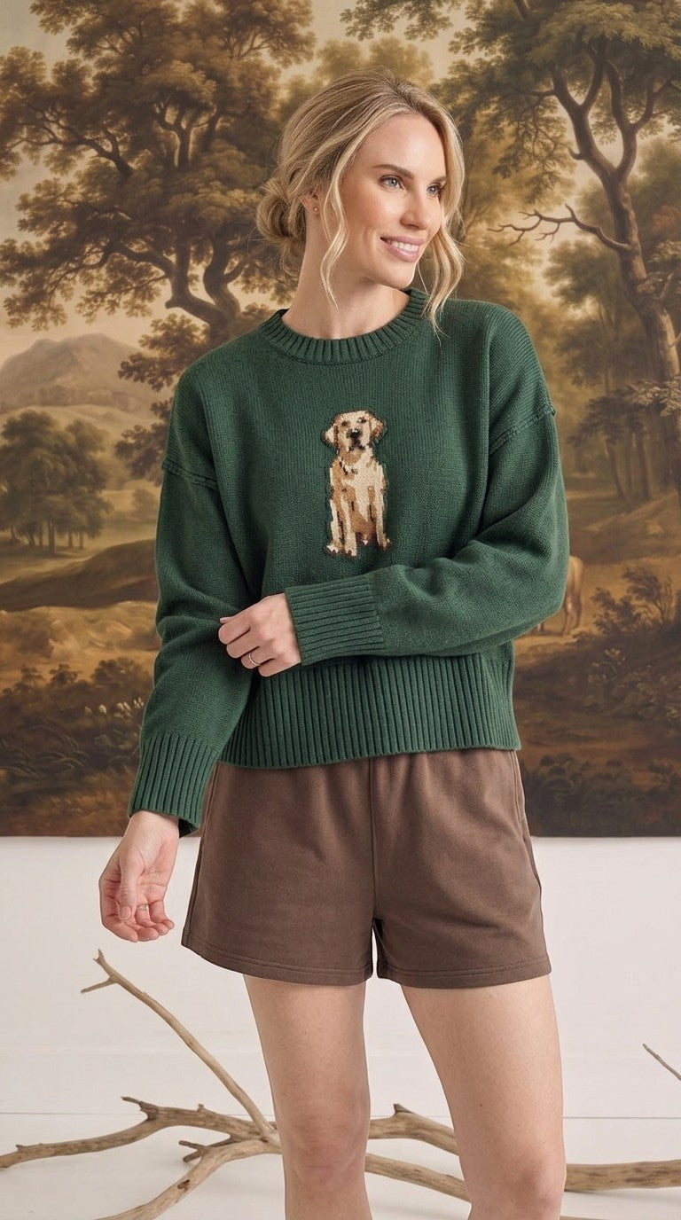 graced The Sydney Retriever Sweater in forest green with a golden retriever knit design worn by a blonde model