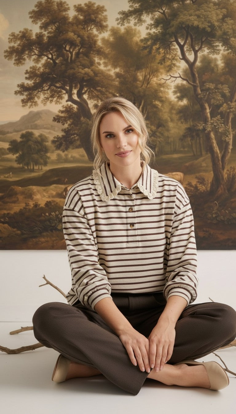 graced Tracy striped polo top with lace collar and cuffs worn by a model in a studio setting